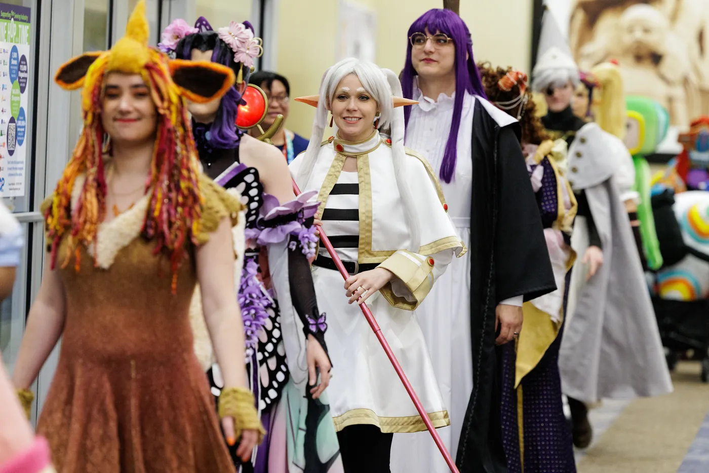 A competitor on stage at the h+h americas Cosplay Competition